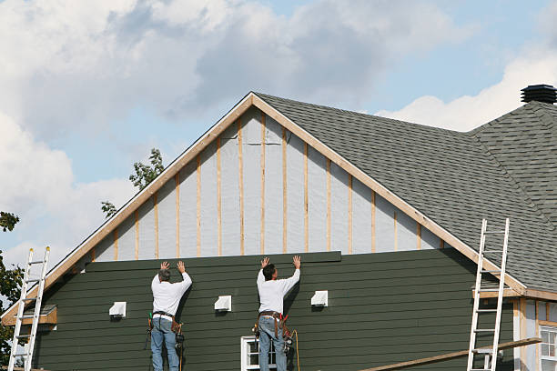 Professional Storm Damage Siding Repair technician working in Mead, WA